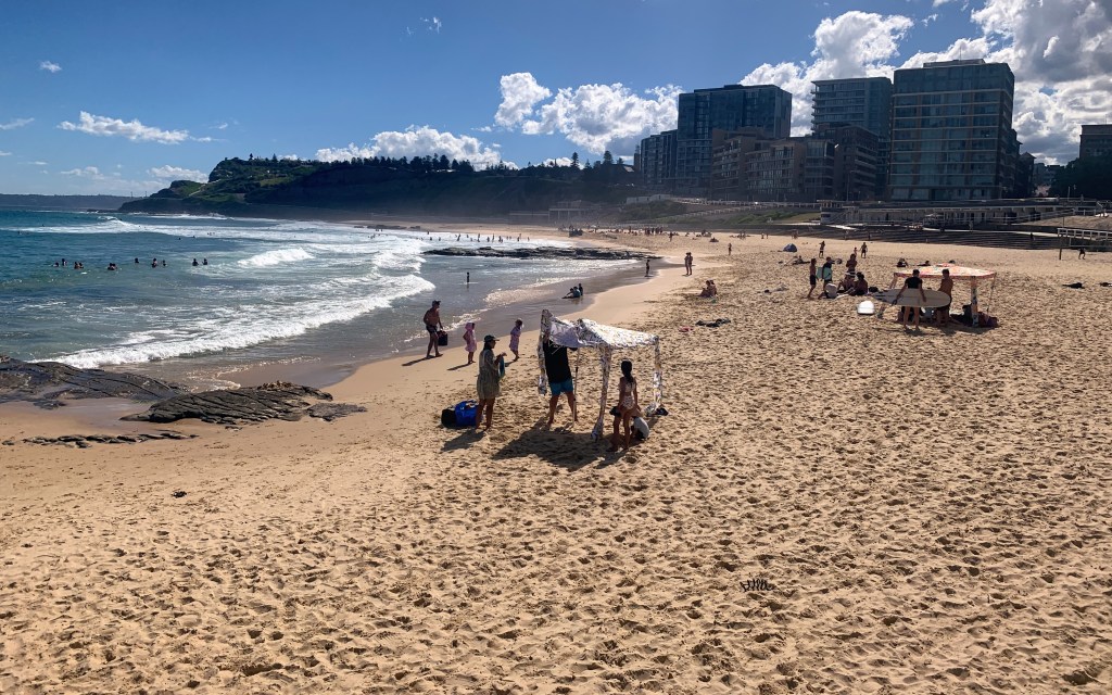 People on Newcastle beach