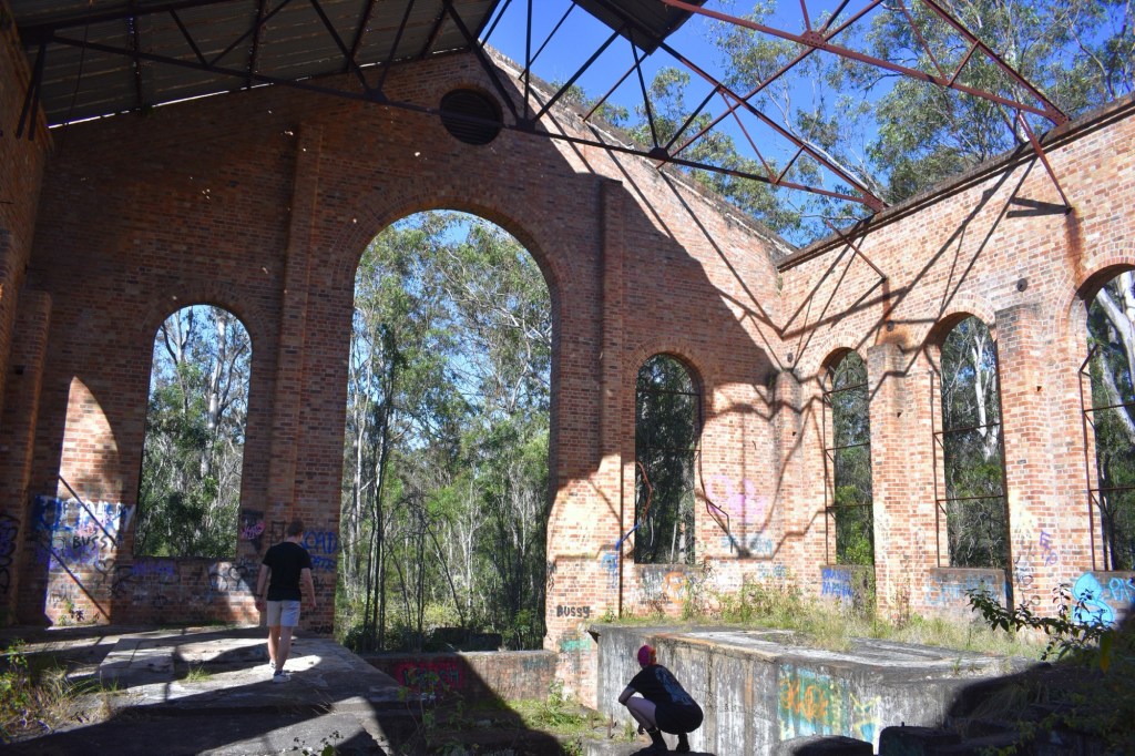 people exploring abandoned building