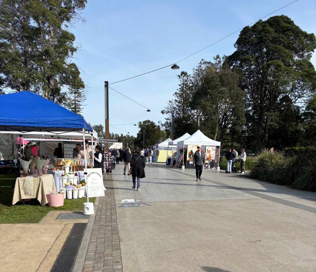 people at market stalls