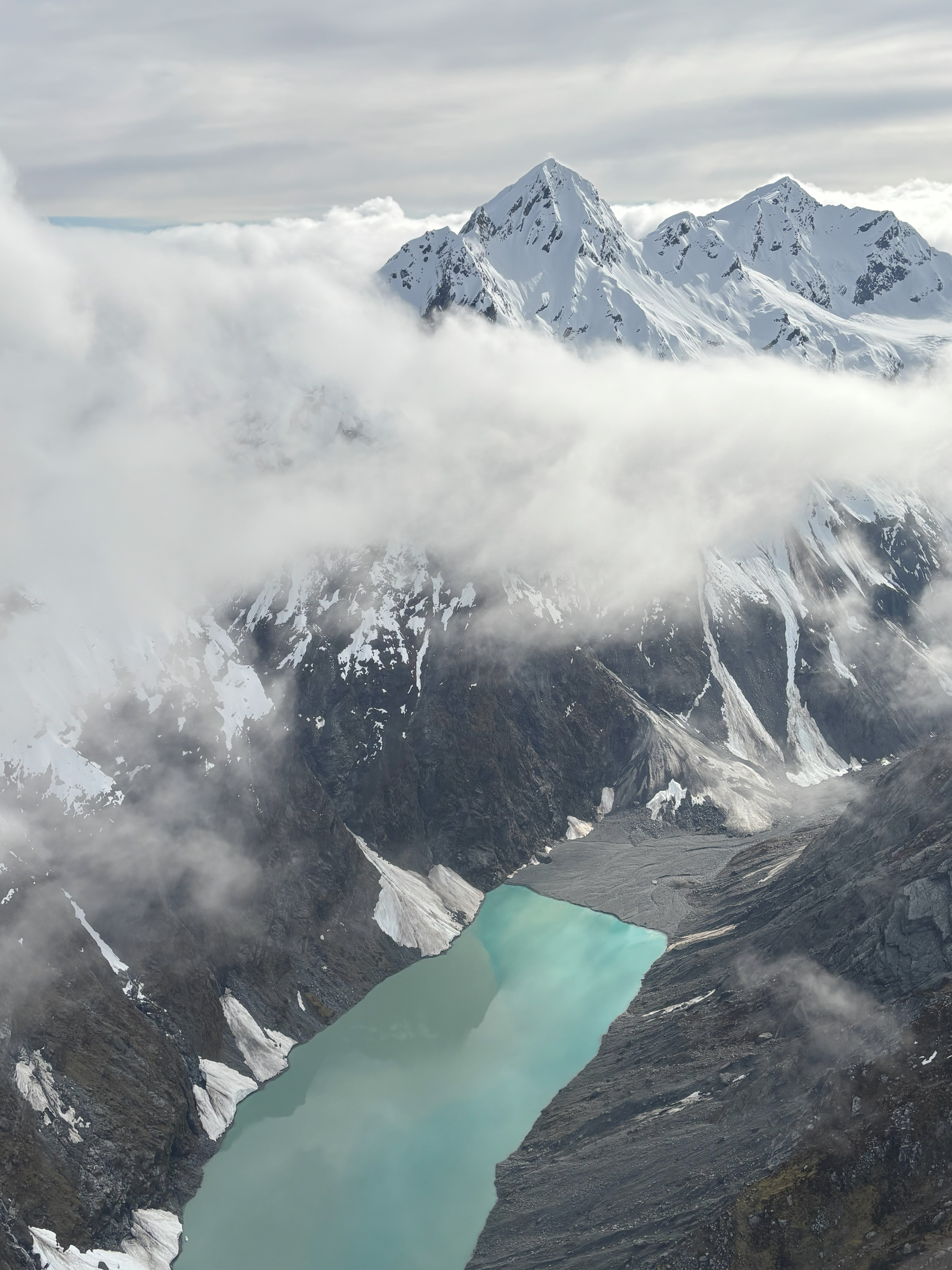 snowy mountains beside river