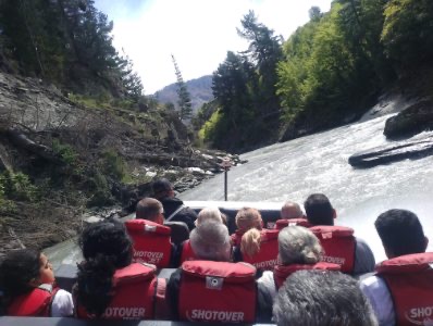 people sitting in jetboat
