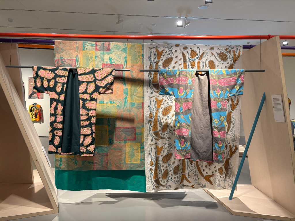 kimono style capes with indigenous Australian pattern